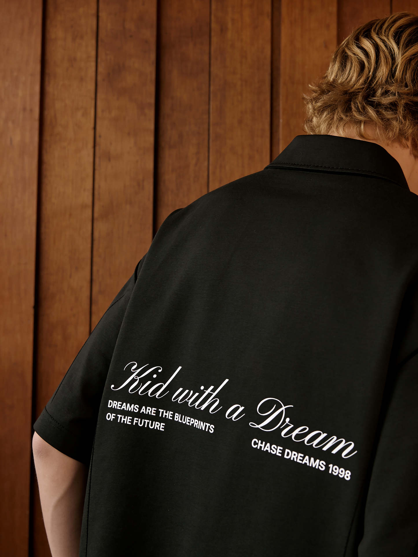 KID WITH A DREAM OVERSIZED UNISEX SHIRT