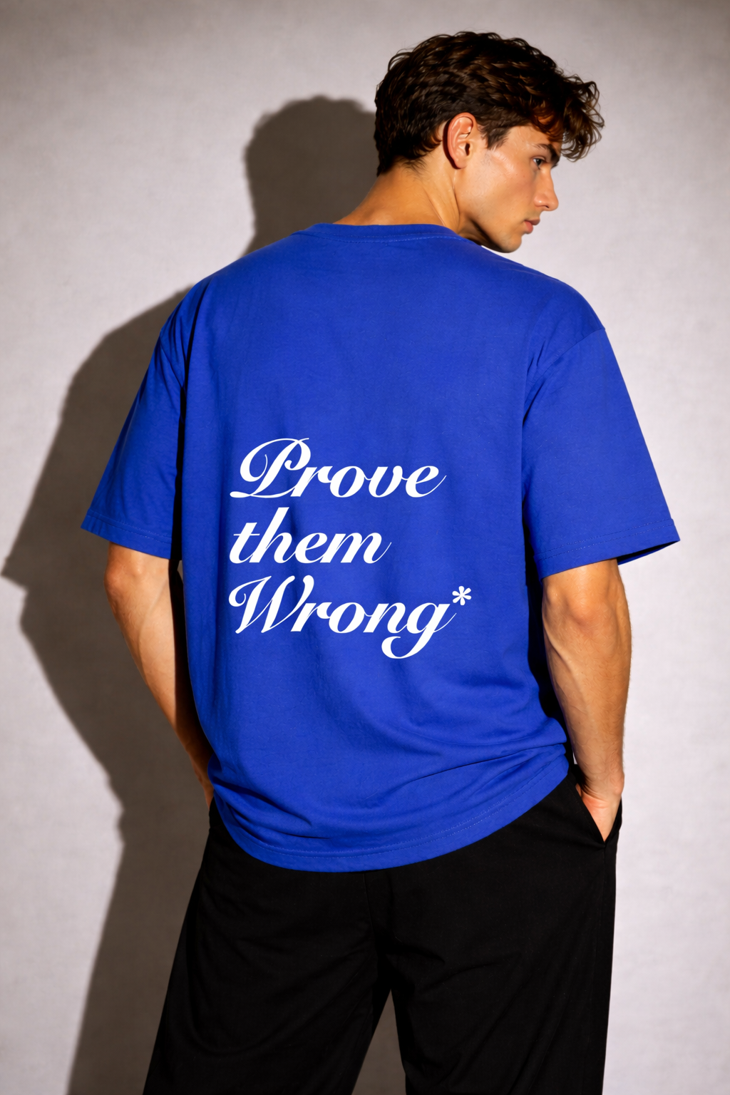 PROVE THEM WRONG UNISEX OVERSIZED T-SHIRT